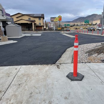 Finished asphalt parking lot and concrete access area at commercial property at Taco Bell in Butte, MT