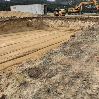 Excavation and grading work for site preparation in Southwest Montana